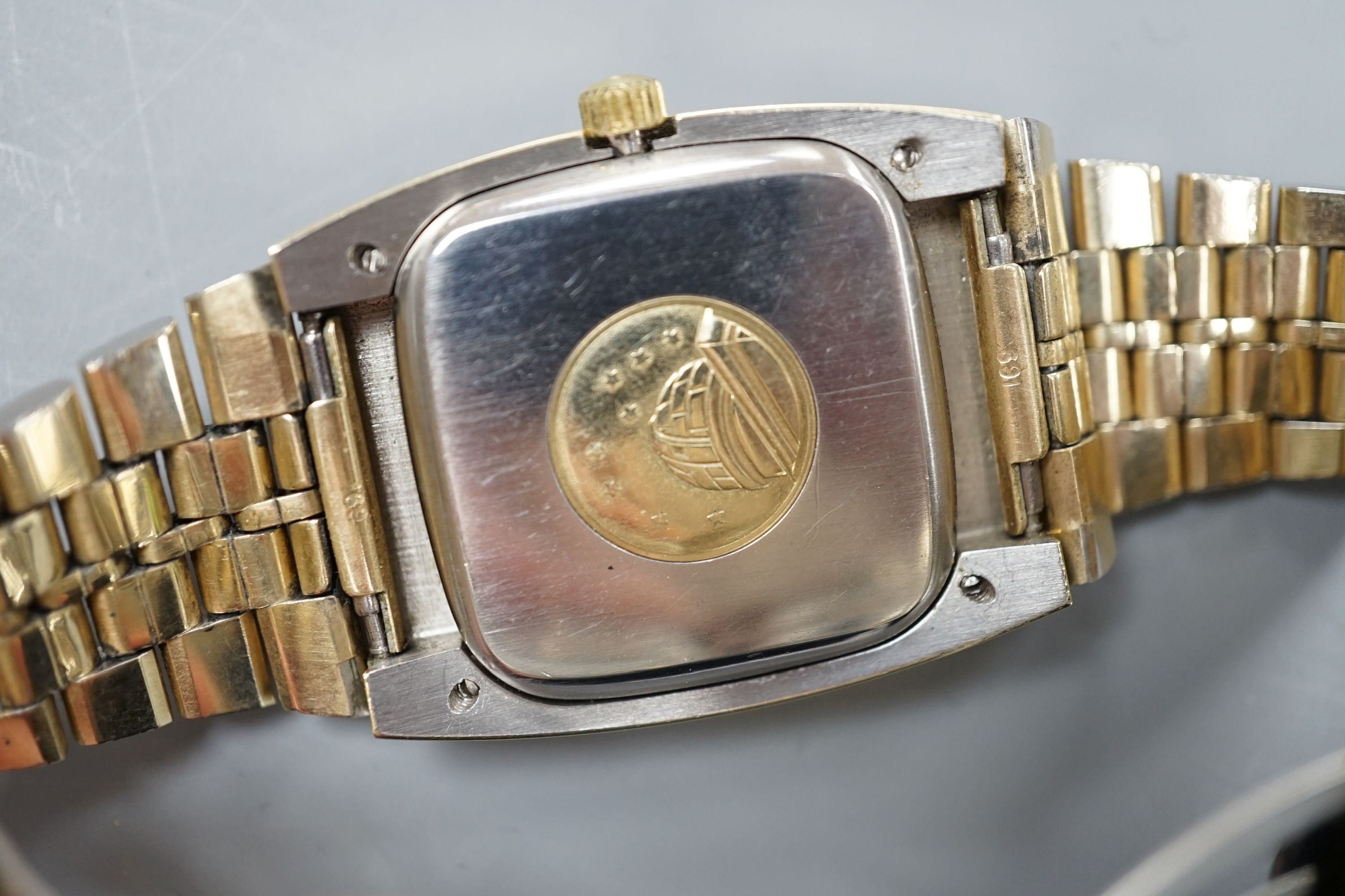 A gentleman's steel and gold plated Omega Constellation automatic wrist watch, on a steel and gold plated Omega bracelet, case diameter 34mm, no box or papers.